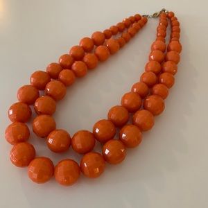 Coral Two Strand Necklace with Faceted Beads.